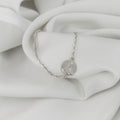 Pulsera de plata con escapulario