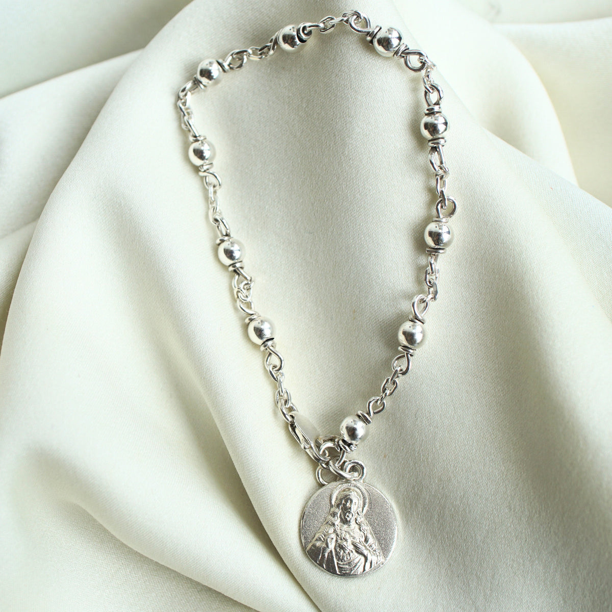 Pulsera denario de plata